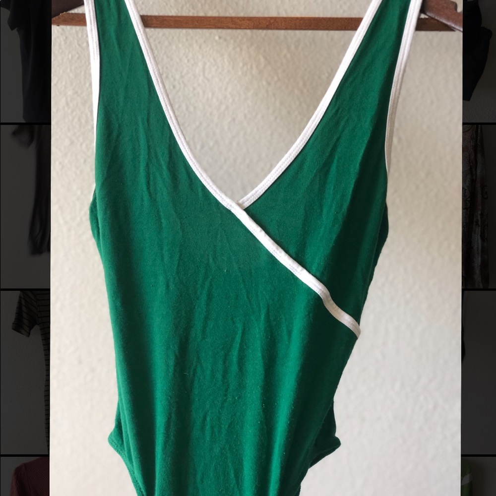Green and white bodysuit